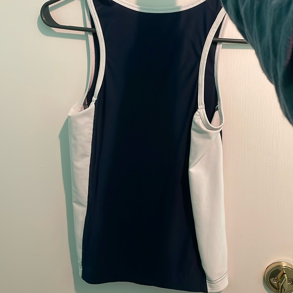 Brand: Puma Size: XS Color: Navy blue and white